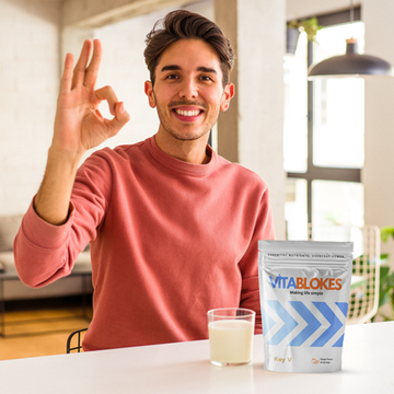 Young man taking vitablokes